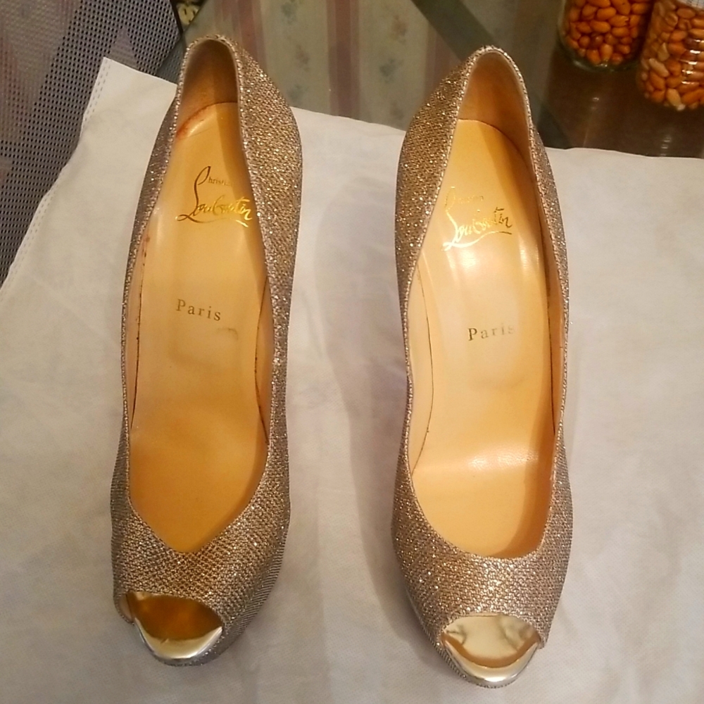 Louboutin women metallic shoe